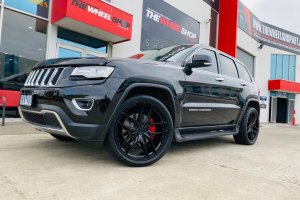JEEP CHEROKEE WITH 22 INCH BLACK WHEELS |  | JEEP
